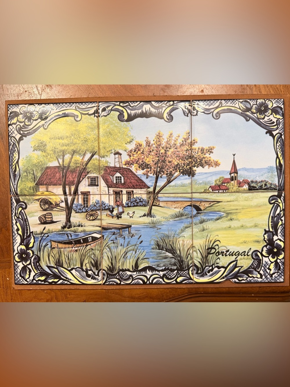 This is a vintage multi-tile decorative ceramic mural from Portugal.